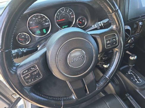 Used 2012 Jeep Wrangler Unlimited Sport AWD/4WD image 12