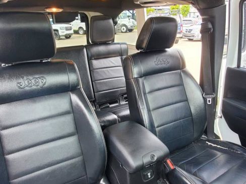 Used 2012 Jeep Wrangler Unlimited Sahara w/ Dual Top Group AWD/4WD image 17