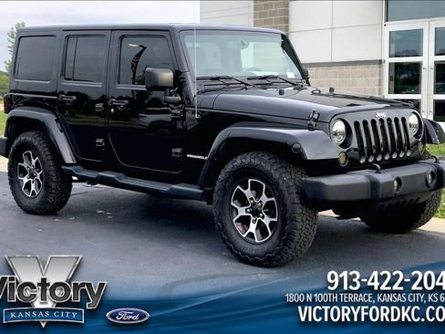 Used 2013 Jeep Wrangler Unlimited Sahara w/ Connectivity Group AWD/4WD image 1