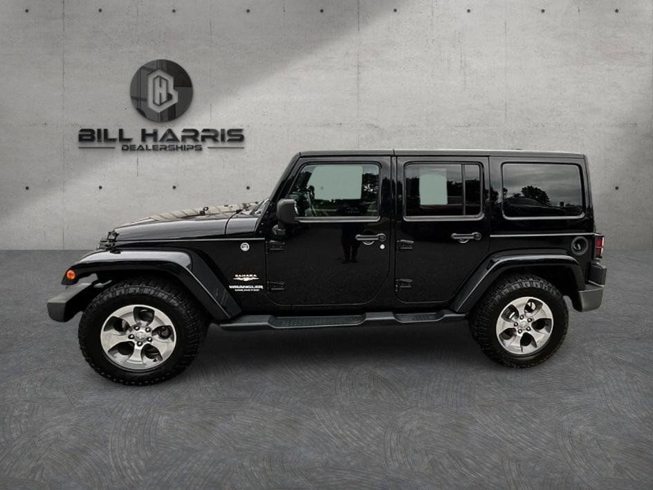 Used 2012 Jeep Wrangler Unlimited Sahara w/ Dual Top Group AWD/4WD image 10