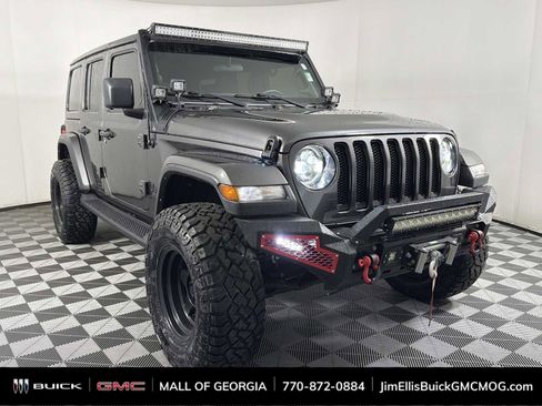 Used 2021 Jeep Wrangler Unlimited Sahara AWD/4WD image 1