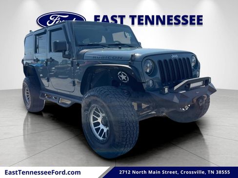 Used 2014 Jeep Wrangler Unlimited Rubicon w/ Dual Top Group AWD/4WD image 1