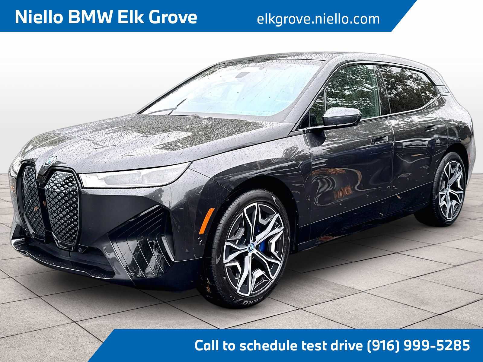 Used 2024 BMW iX xDrive50 w/ Sport Package AWD/4WD image 1
