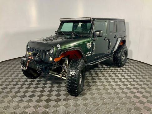 Used 2011 Jeep Wrangler Unlimited Sport AWD/4WD image 8