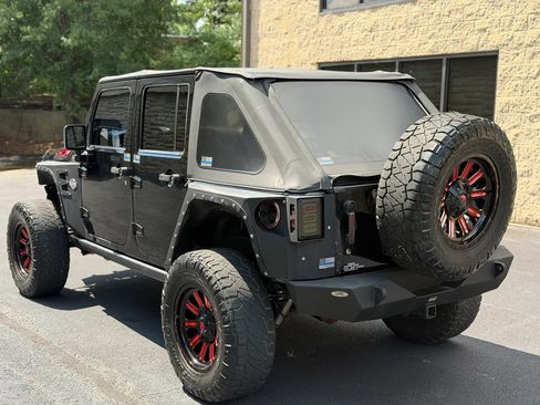 Used 2013 Jeep Wrangler Unlimited Sahara w/ Mopar Chrome Edition Group AWD/4WD image 9
