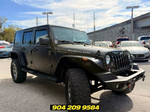 Used 2015 Jeep Wrangler Unlimited Rubicon w/ Dual Top Group AWD/4WD image 9