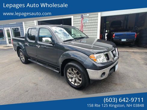 Used 2014 Nissan Frontier SL image 1