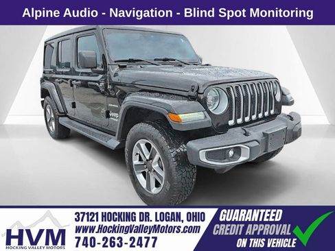 Used 2019 Jeep Wrangler Unlimited Sahara w/ Uconnect 4C Nav & Sound Group AWD/4WD image 1