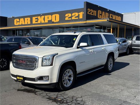 Used 2015 GMC Yukon XL SLT w/ Open Road Package AWD/4WD image 1