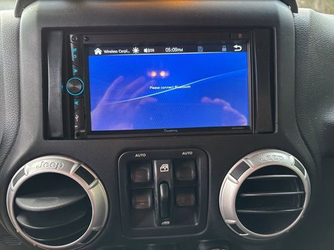 Used 2015 Jeep Wrangler Unlimited Sahara w/ Max Tow Package image 16