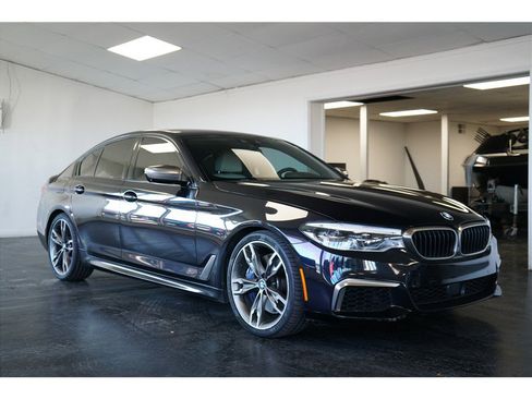 Used 2020 BMW M550i xDrive w/ Executive Package image 1