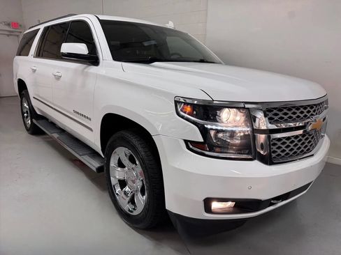 Used 2018 Chevrolet Suburban LT w/ LT Signature Package AWD/4WD image 1