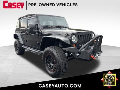 Used 2012 Jeep Wrangler Unlimited Sport image 1