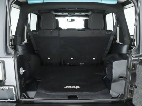 Used 2014 Jeep Wrangler Unlimited Sahara w/ Dual Top Group AWD/4WD image 16