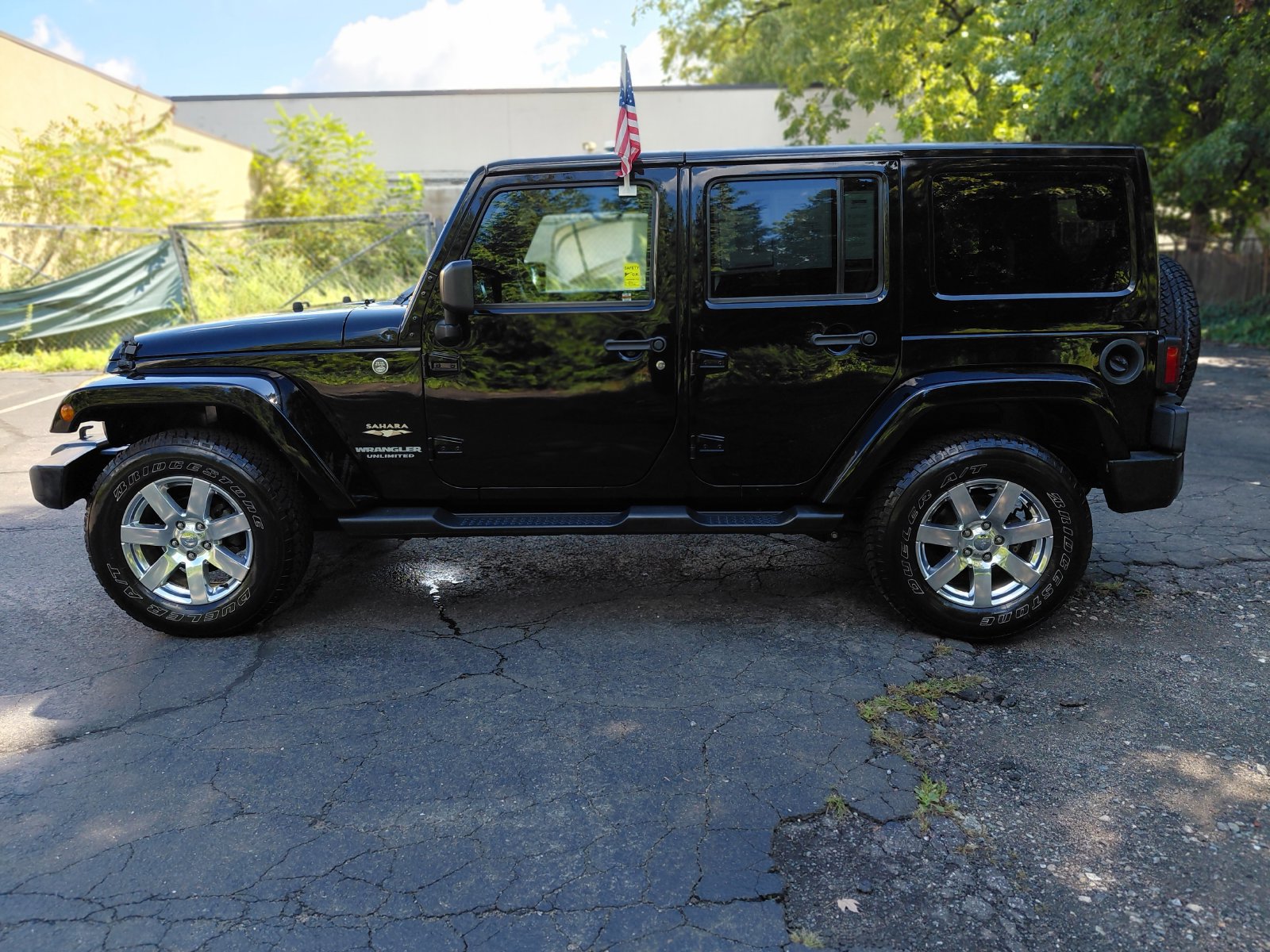 Used 2015 Jeep Wrangler Unlimited Sahara w/ Dual Top Group AWD/4WD image 25