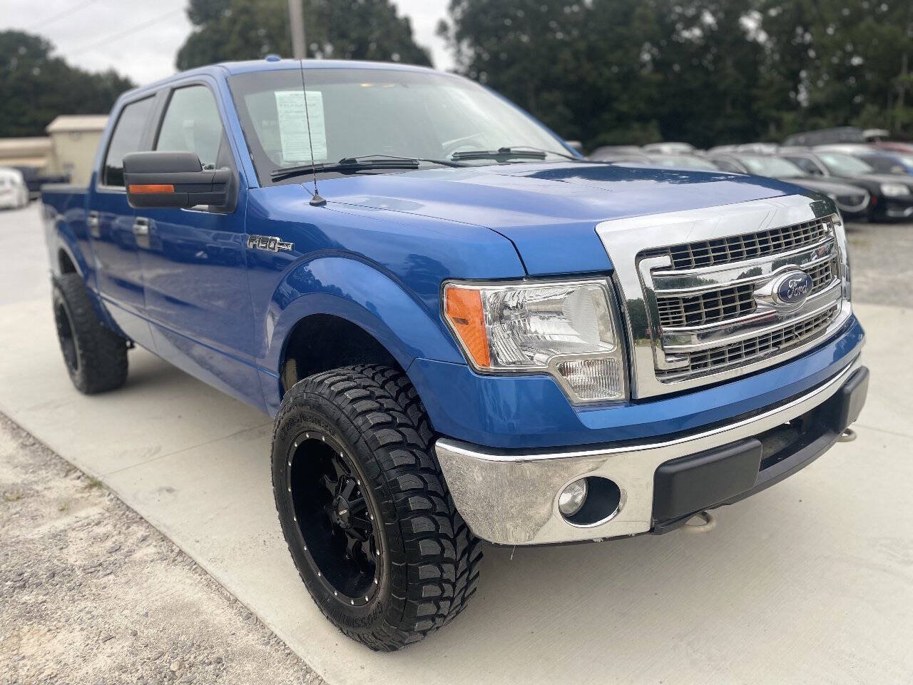 Used 2014 Ford F150 XLT w/ Equipment Group 302A Luxury AWD/4WD image 1