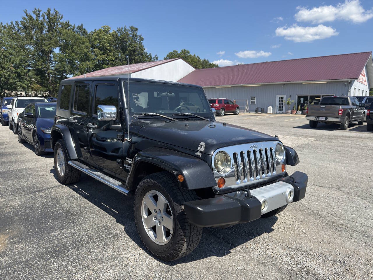 Used 2009 Jeep Wrangler Unlimited Sahara w/ Mopar Leather Group AWD/4WD image 5