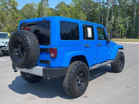 Used 2011 Jeep Wrangler Unlimited Sahara w/ Dual Top Group AWD/4WD image 7