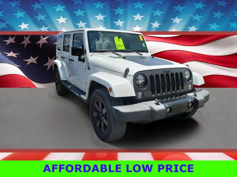 Used 2014 Jeep Wrangler Unlimited Sahara AWD/4WD image 1