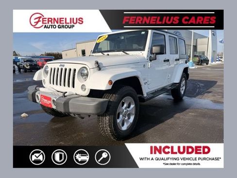 Used 2014 Jeep Wrangler Unlimited Sahara w/ Dual Top Group image 1
