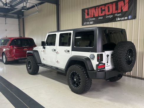 Used 2011 Jeep Wrangler Unlimited Rubicon w/ Dual Top Group AWD/4WD image 3