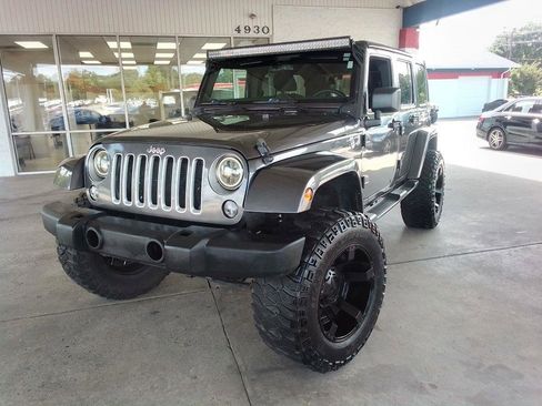 Used 2016 Jeep Wrangler Unlimited Sahara w/ Connectivity Group AWD/4WD image 1