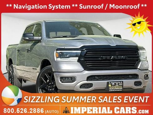Used 2023 RAM 1500 Laramie AWD/4WD image 1
