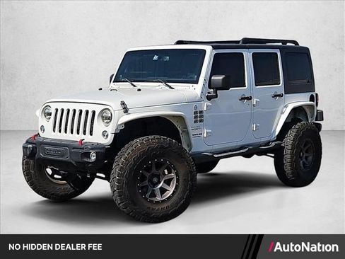 Used 2014 Jeep Wrangler Unlimited Sahara w/ Max Tow Package AWD/4WD image 1