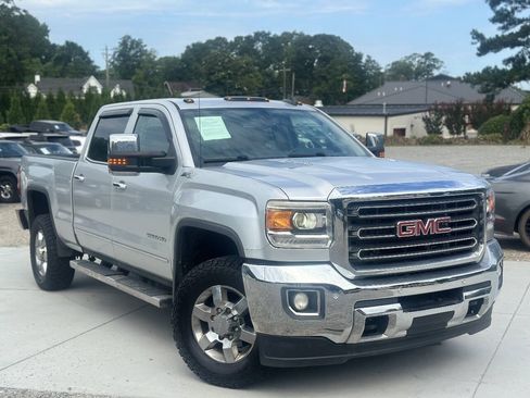 Used 2016 GMC Sierra 2500 SLT w/ Duramax Plus Package AWD/4WD image 1