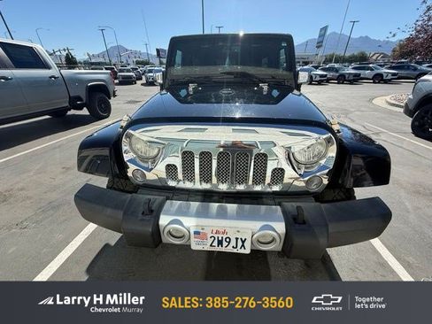 Used 2014 Jeep Wrangler Unlimited Sahara w/ Dual Top Group AWD/4WD image 1