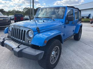 Used 2014 Jeep Wrangler Unlimited Freedom Edition video 1