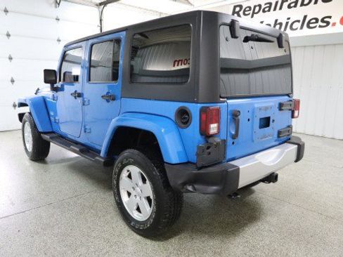 Used 2012 Jeep Wrangler Unlimited Sahara w/ Dual Top Group AWD/4WD image 3