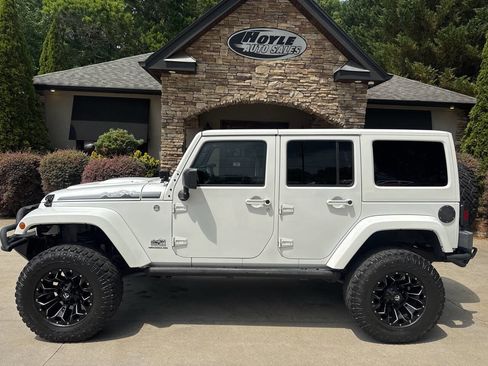 Used 2014 Jeep Wrangler Unlimited Sahara AWD/4WD image 1