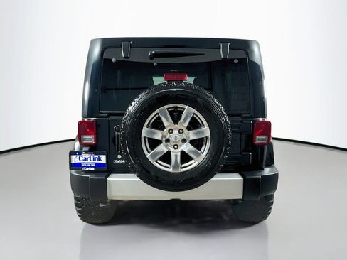 Used 2013 Jeep Wrangler Unlimited Sahara w/ Dual Top Group AWD/4WD image 7