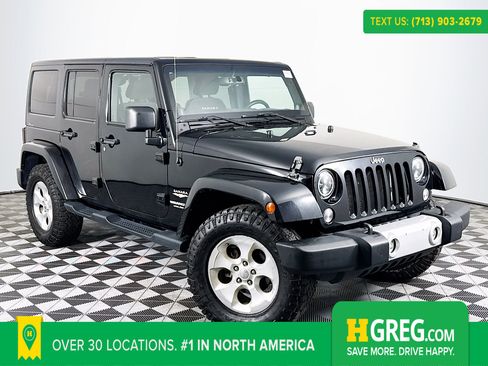 Used 2014 Jeep Wrangler Unlimited Sahara image 1