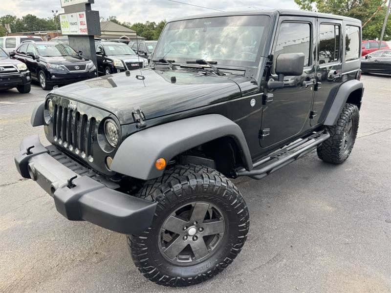 Used 2012 Jeep Wrangler Unlimited Sport AWD/4WD image 2