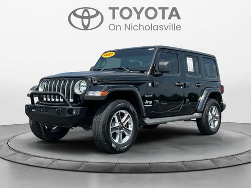 Used 2021 Jeep Wrangler Unlimited Sahara AWD/4WD image 1