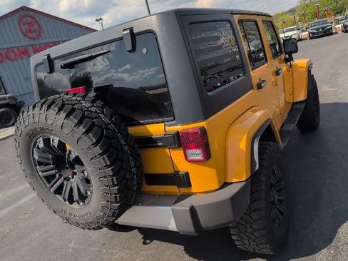 Used 2013 Jeep Wrangler Unlimited Sahara w/ Dual Top Group AWD/4WD image 8