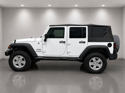 Used 2013 Jeep Wrangler Unlimited Sport AWD/4WD image 1