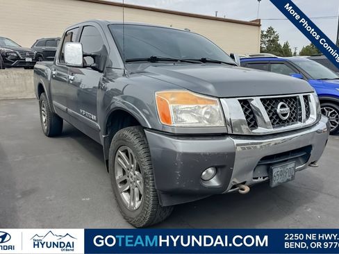 Used 2014 Nissan Titan SL AWD/4WD image 1