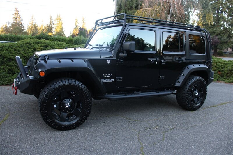 Used 2009 Jeep Wrangler Unlimited Sahara AWD/4WD image 1