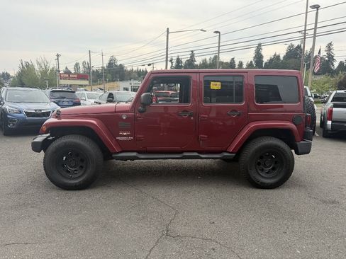 Used 2012 Jeep Wrangler Unlimited Sahara w/ Dual Top Group AWD/4WD image 2