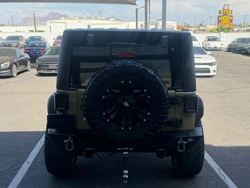 Used 2013 Jeep Wrangler Unlimited Rubicon w/ Dual Top Group AWD/4WD image 8