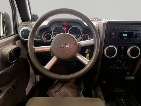 Used 2010 Jeep Wrangler Unlimited Sahara w/ Mopar Chrome Edition Group AWD/4WD image 10
