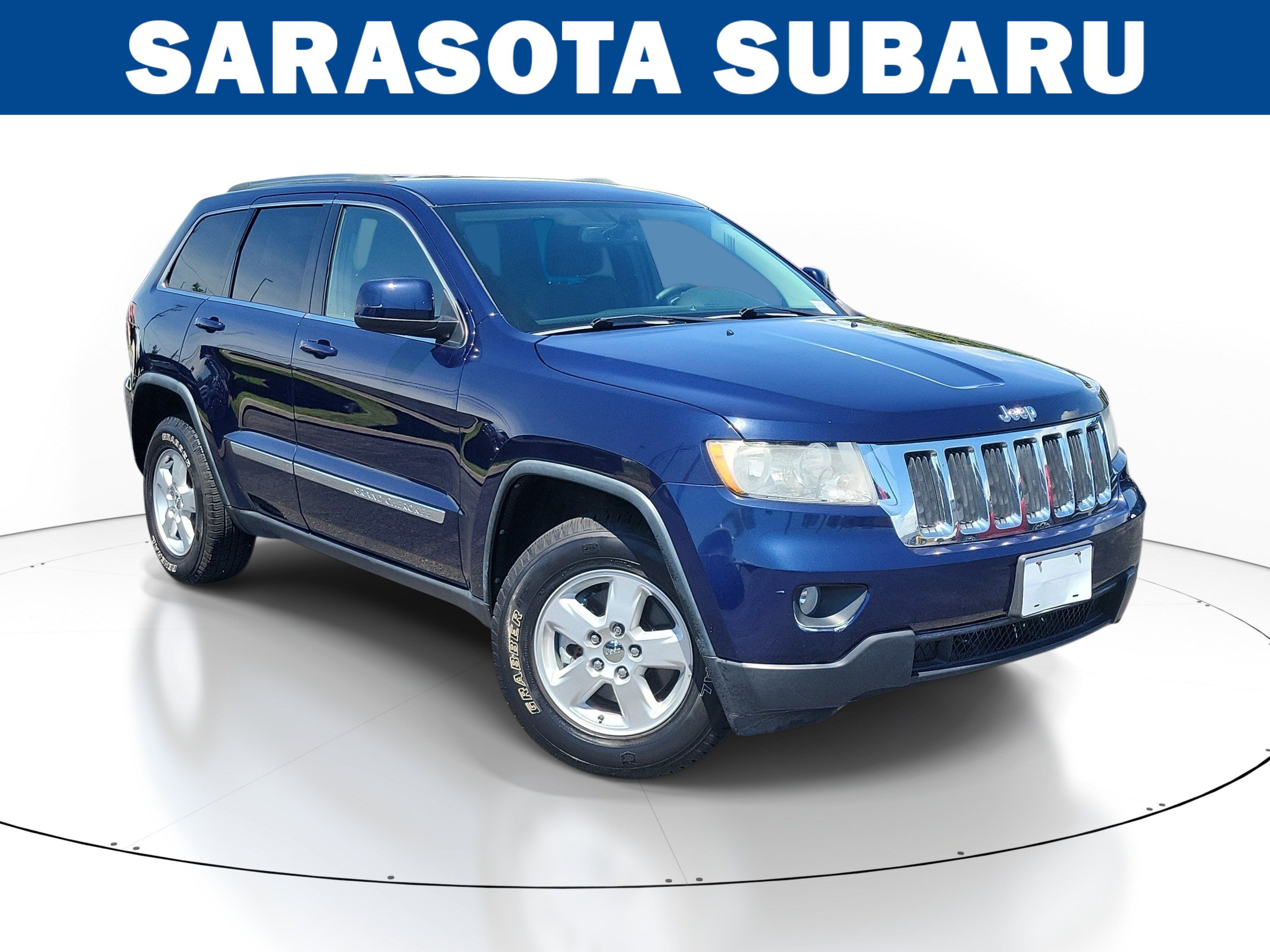 Used 2013 Jeep Grand Cherokee Laredo w/ Laredo E Group AWD/4WD image 1
