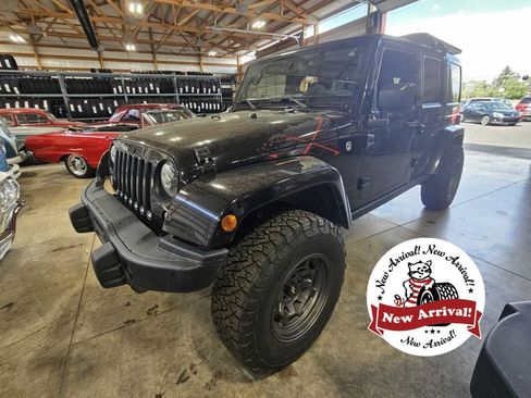 Used 2016 Jeep Wrangler Unlimited Sahara AWD/4WD image 1