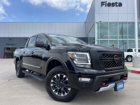 Used 2024 Nissan Titan PRO-4X w/ Pro-4x Utility Package AWD/4WD image 1