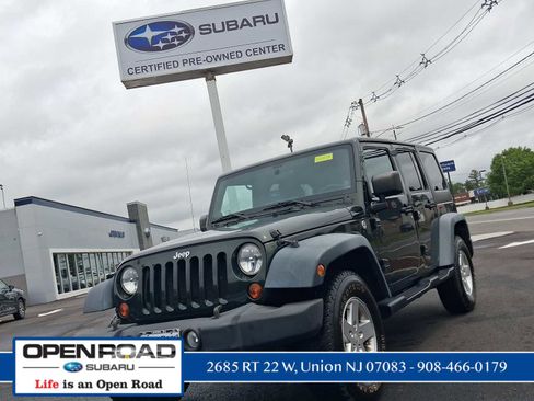 Used 2011 Jeep Wrangler Unlimited Sport AWD/4WD image 1