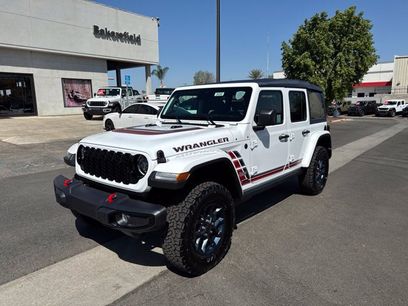 New 2026 Jeep Wrangler Unlimited Sport w/ Dual Top Group