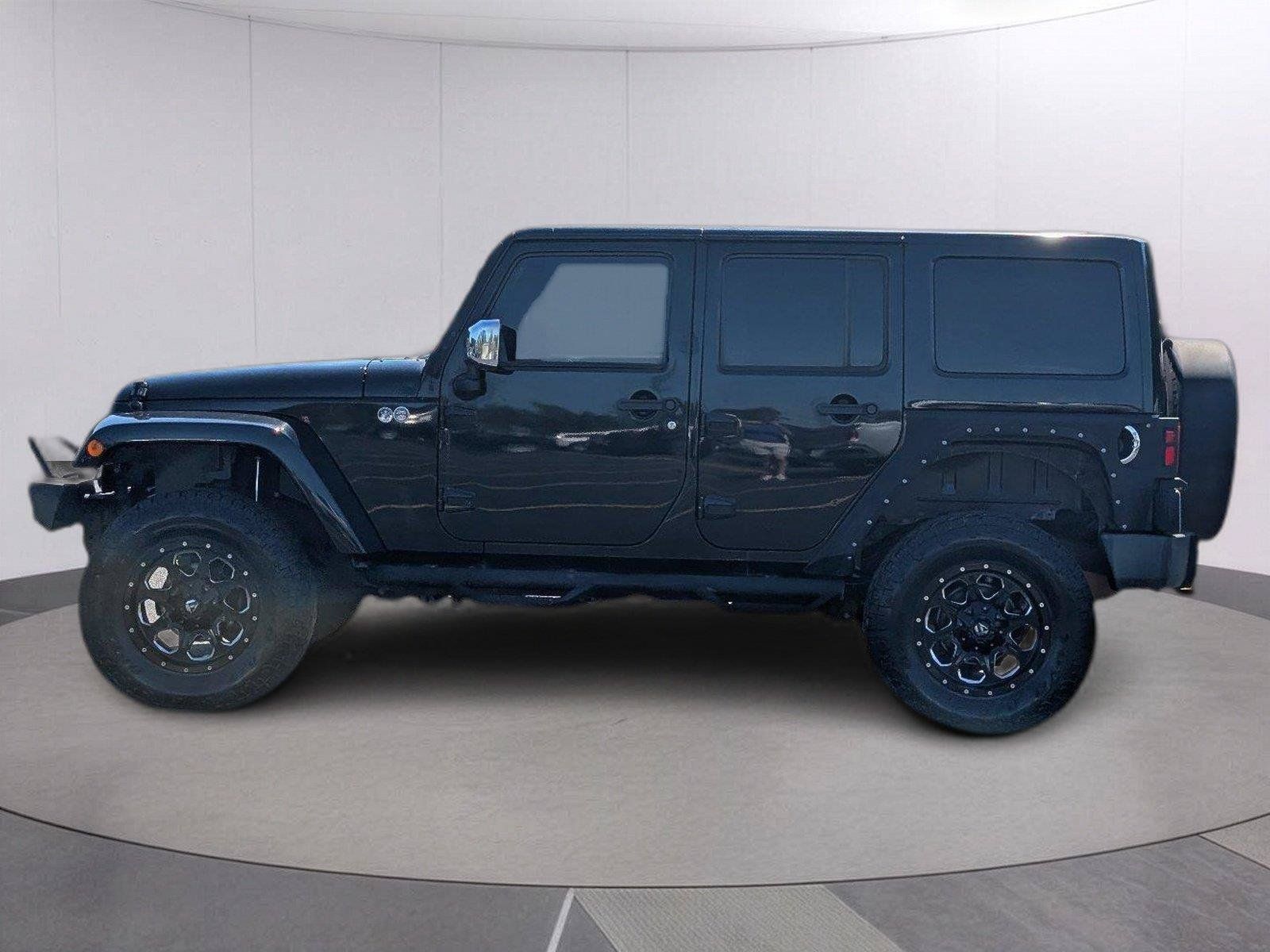 Used 2012 Jeep Wrangler Unlimited Sahara AWD/4WD image 2